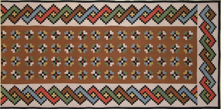 Fragment de covor cu motiv de ornament mărunt (în centru)