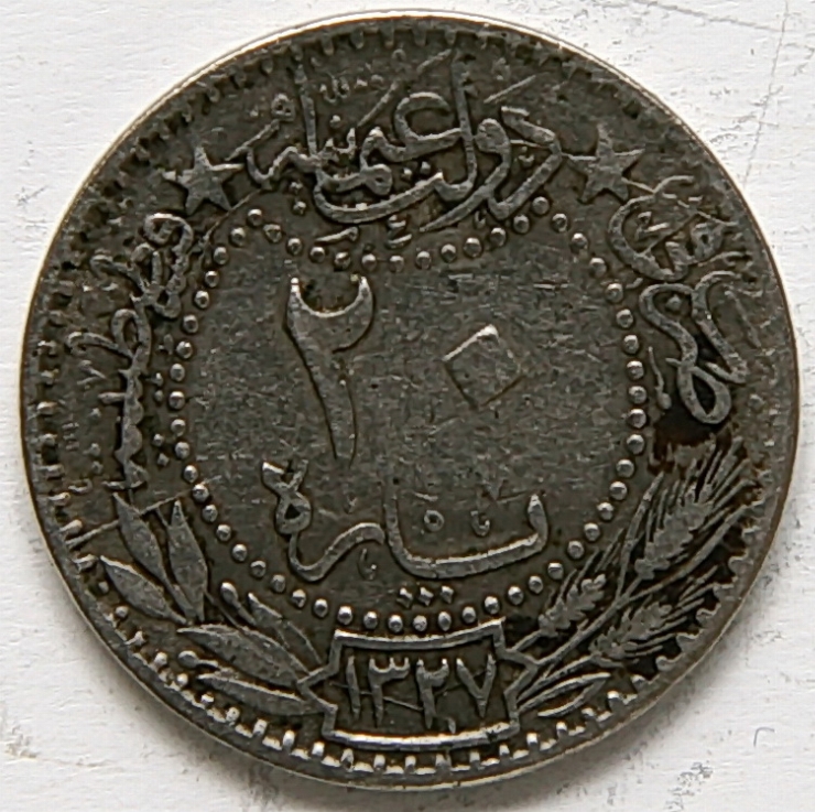 Monedă
