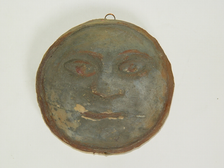 Plachetă cu simbolul soarelui