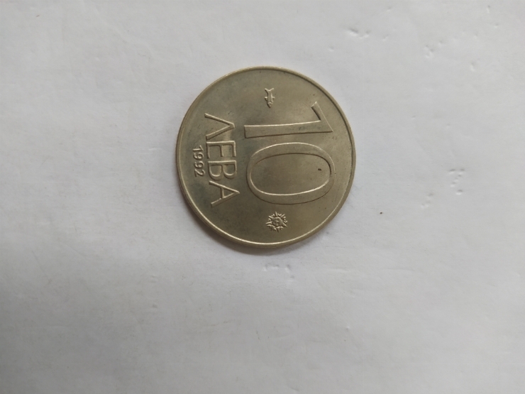 монета