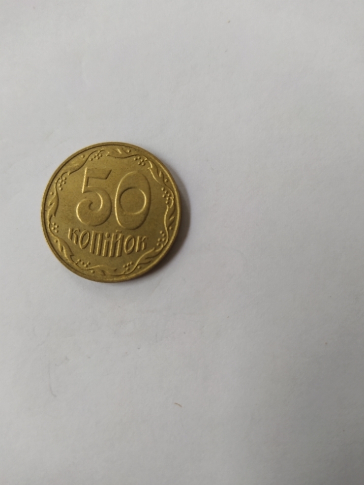 монета