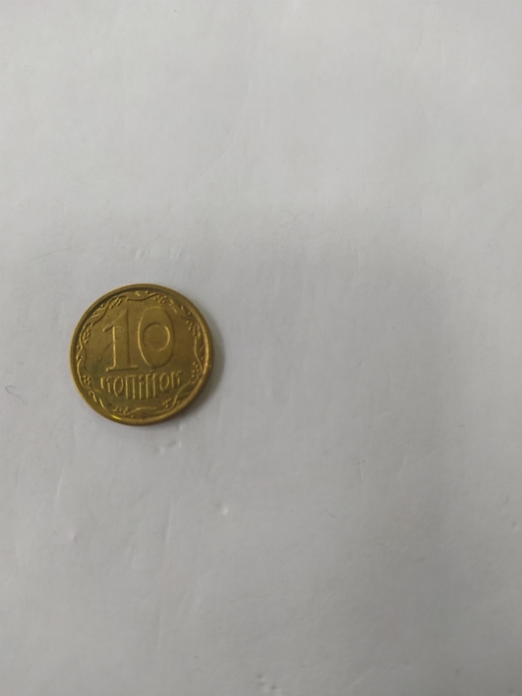 монета