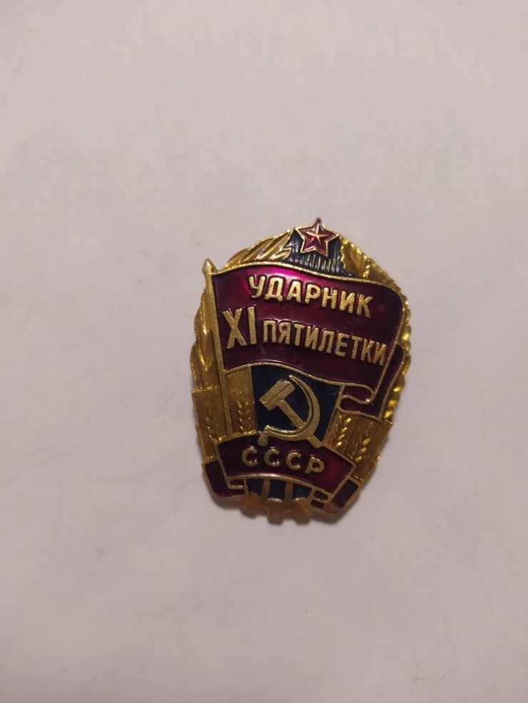 значок