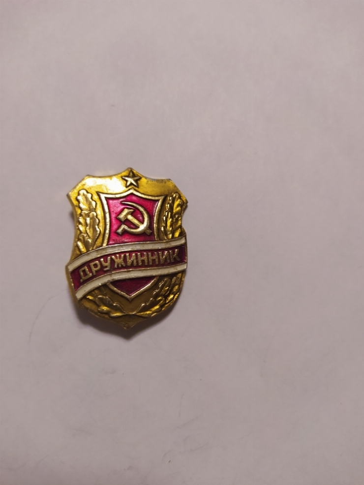 значок