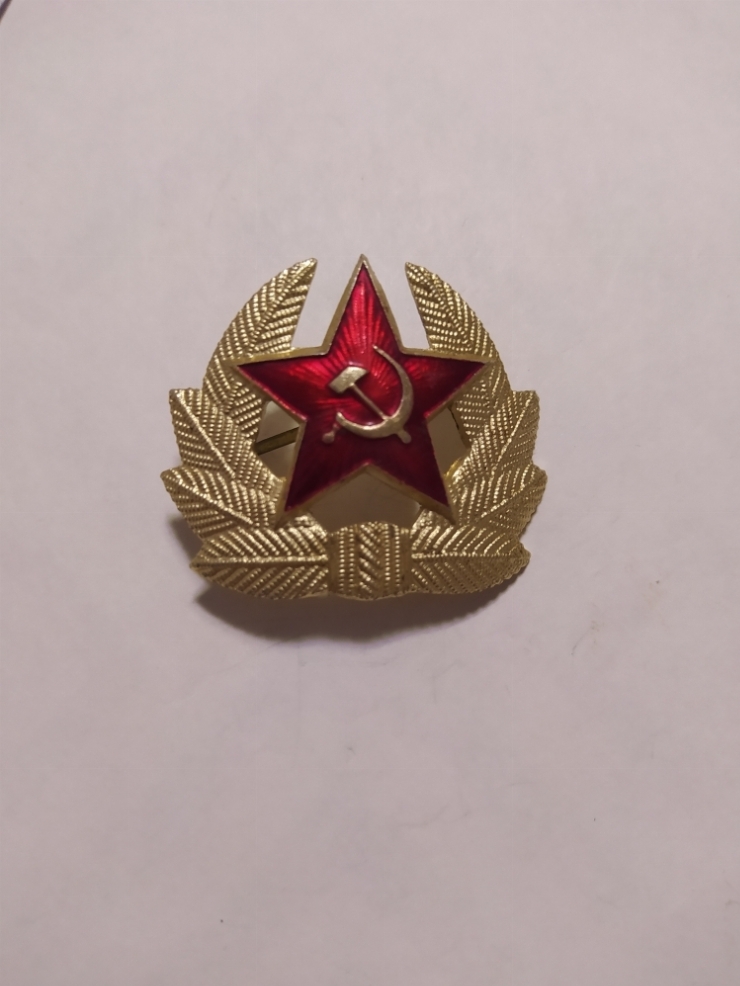 значок