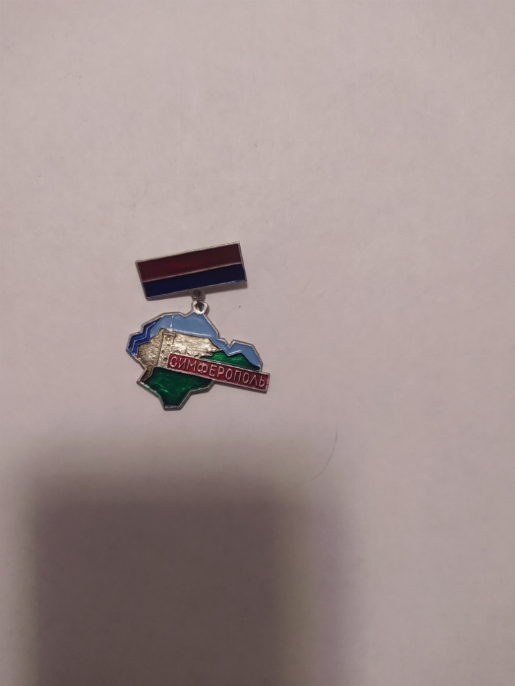 значок