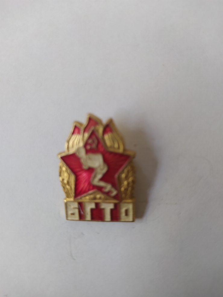 значок