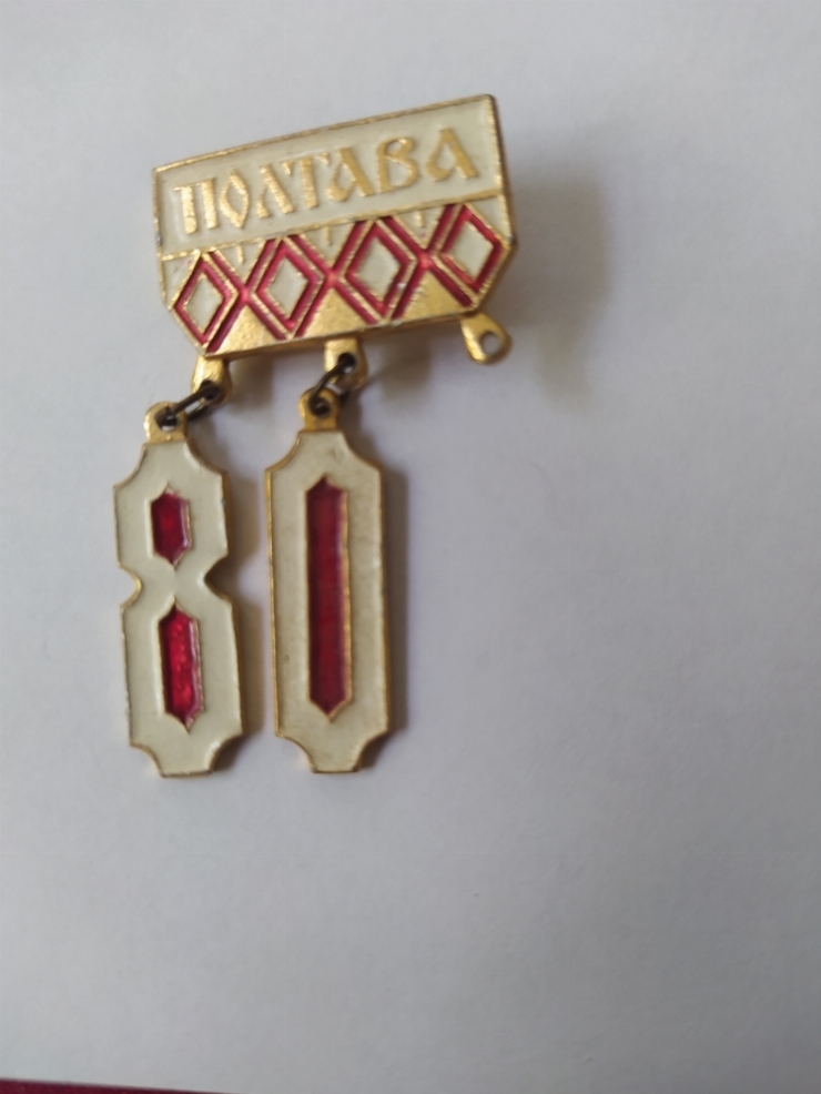 значок