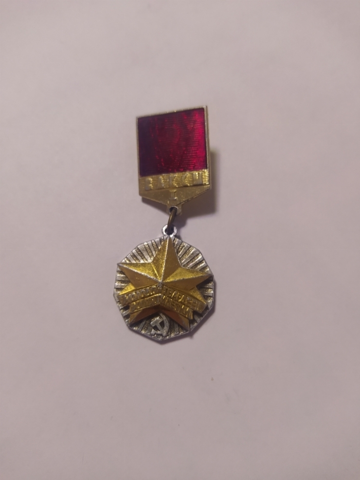 значок