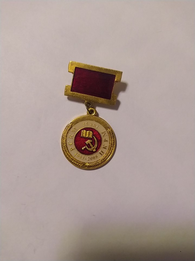 значок