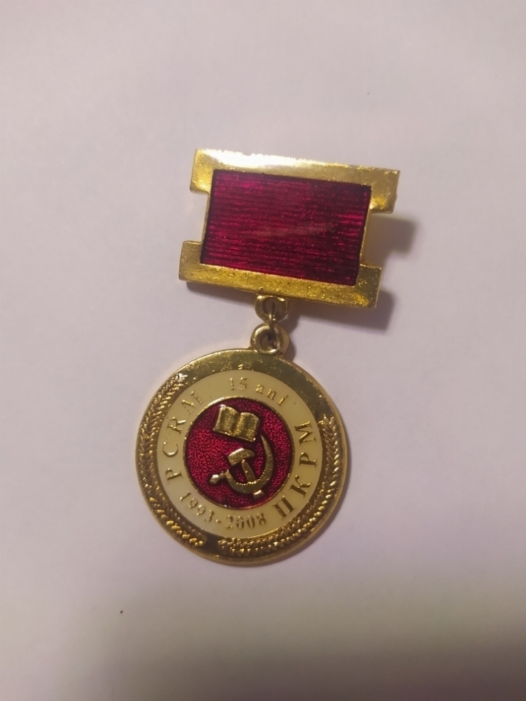 значок