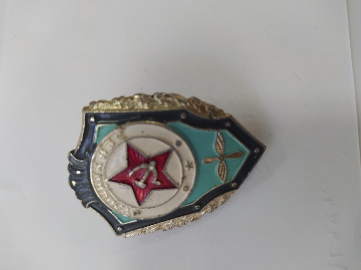 значок