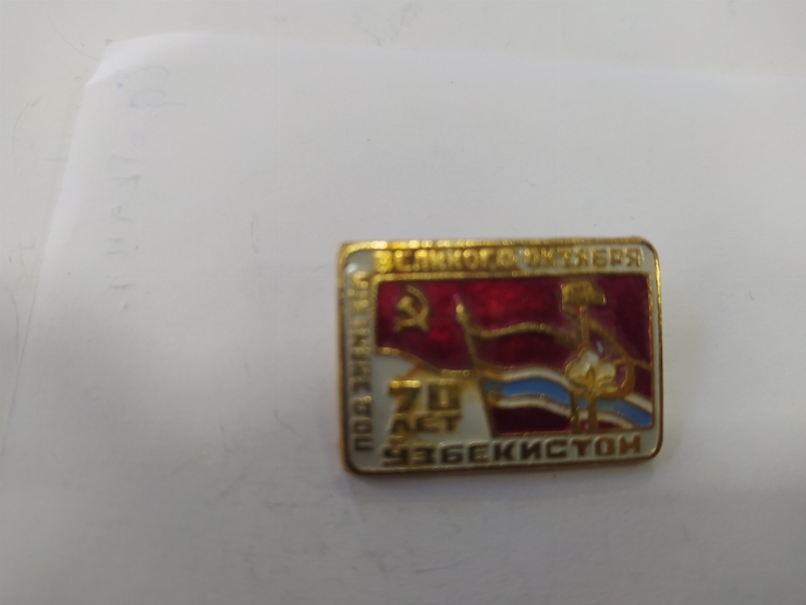 значок