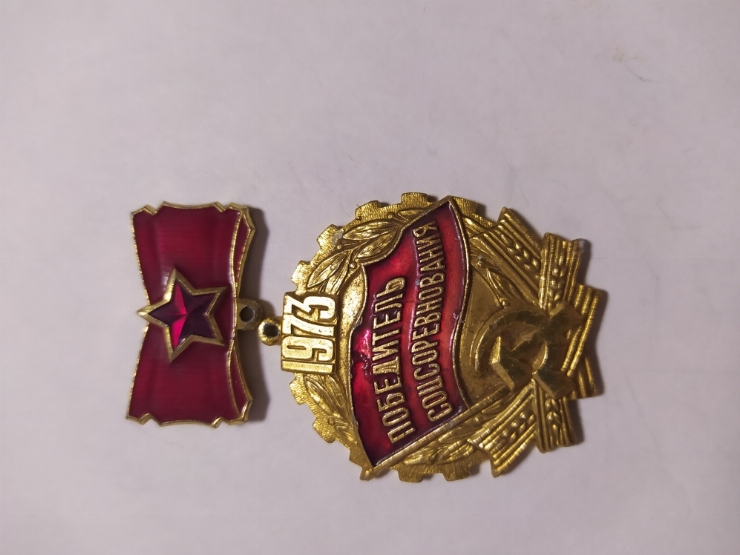 значок