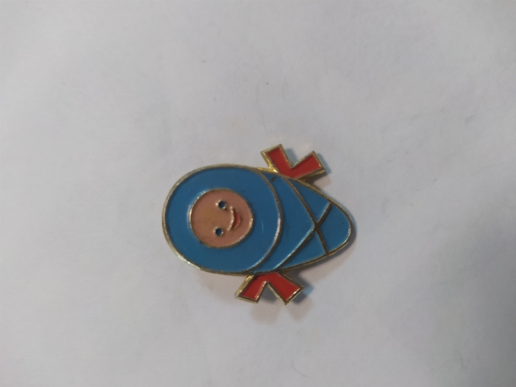 значок