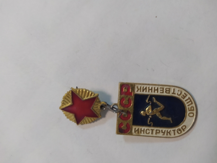 значок