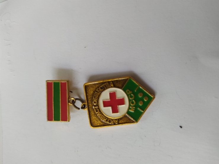 значок