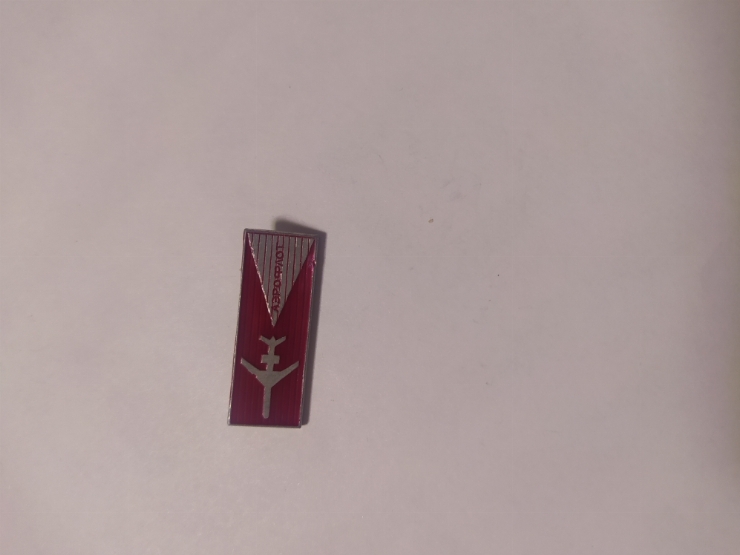 значок