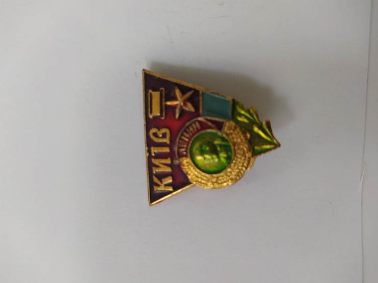 значок