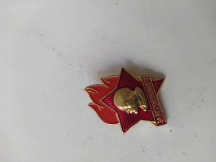 значок