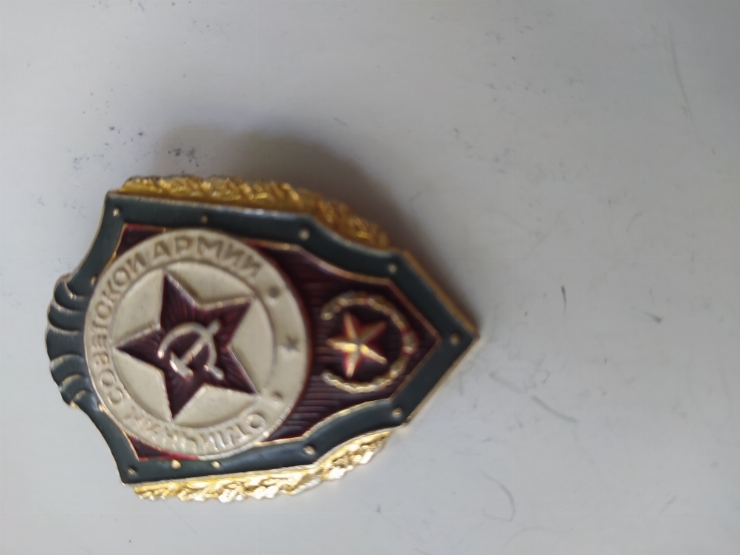 значок