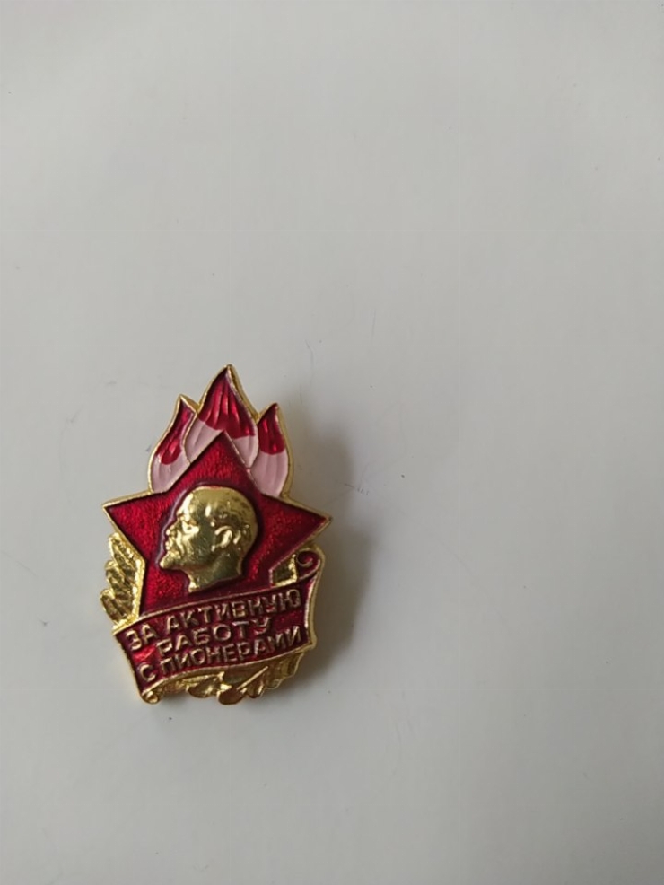 значок
