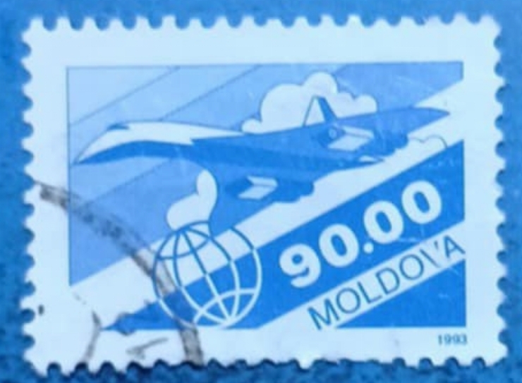 „Timbru poștal Moldova 1993 – Avion supersonic și glob pământesc”
