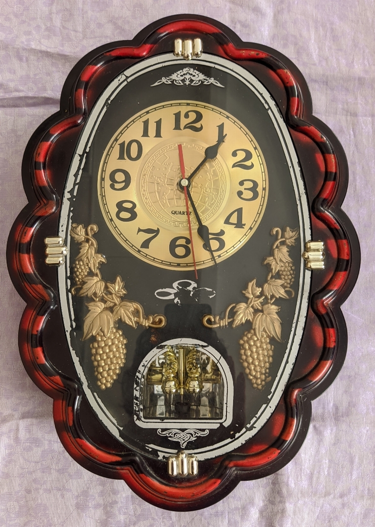 Ceas de perete ,, QUARTZ”.   