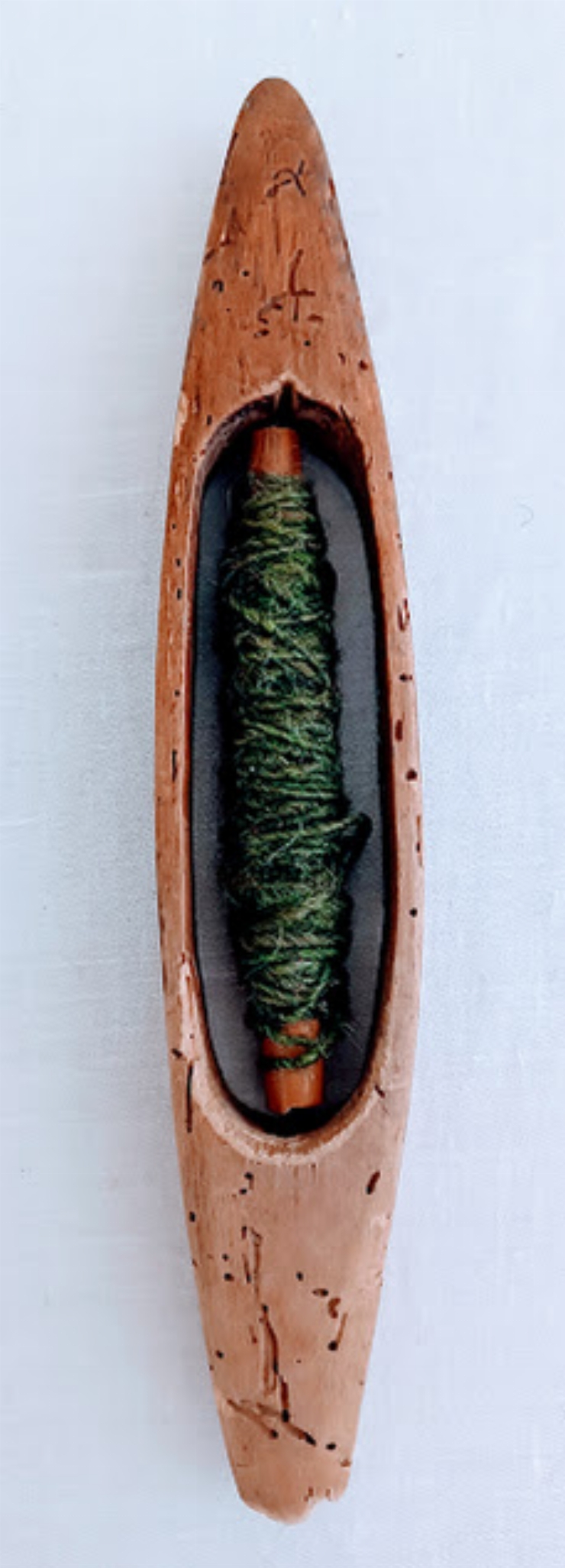            Unelte  de  țesut .  Suveică